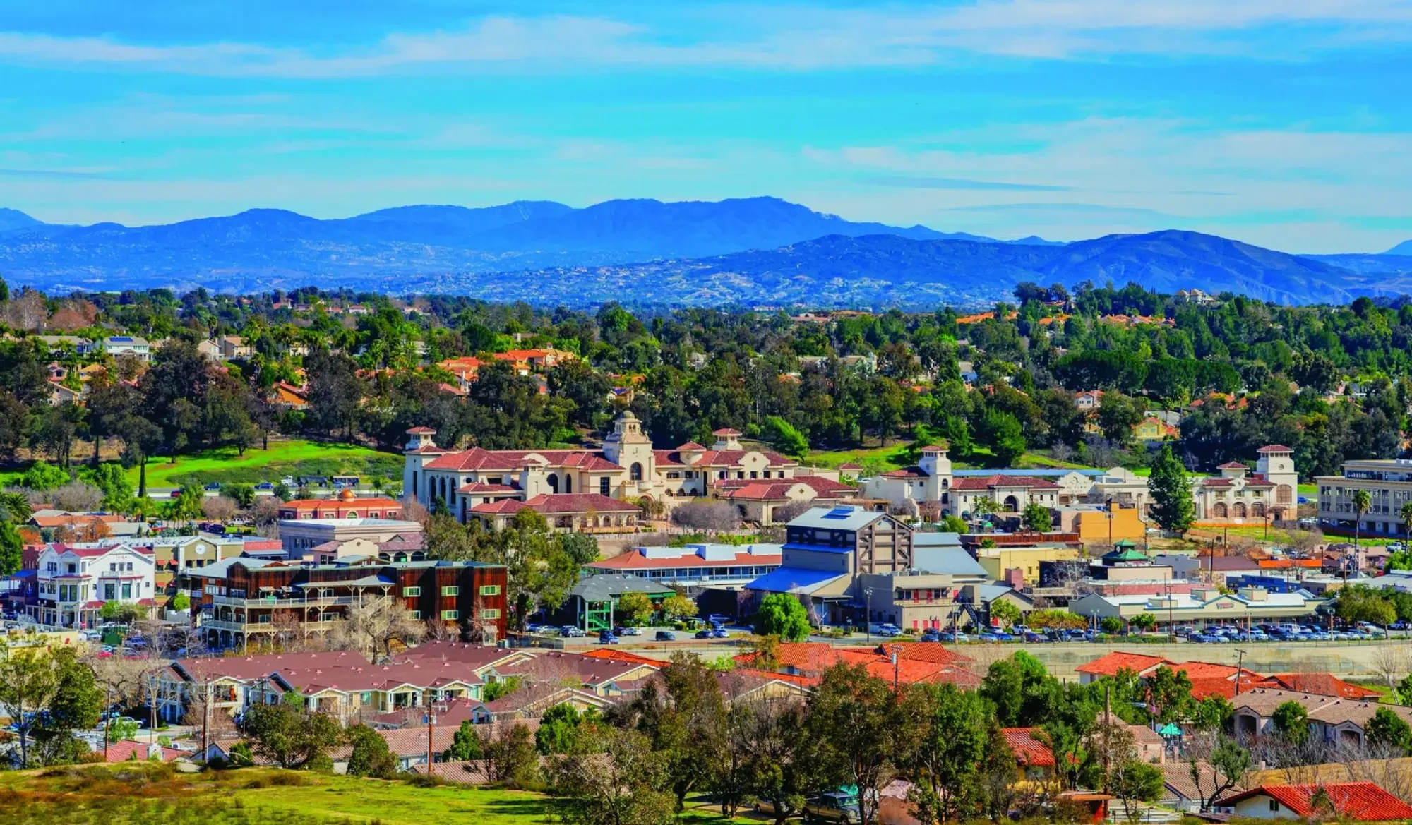 Temecula, CA homes and business district below the mountains