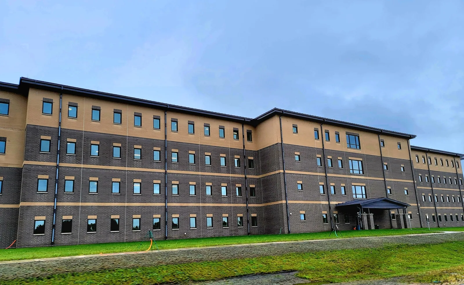 Barracks roof work with occupied-room review